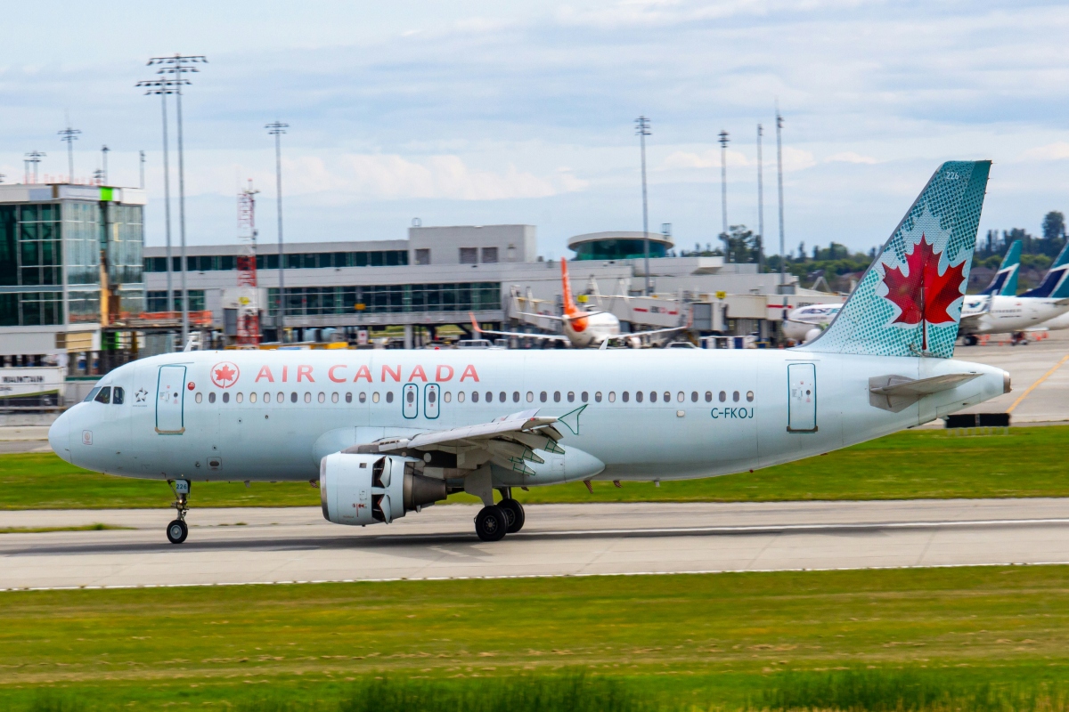 Air Canada airplane parked on the tarmac.