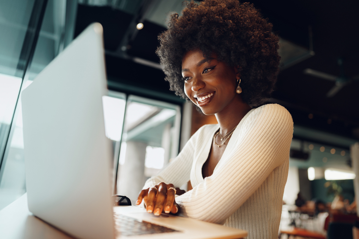 woman shopping online at cafe