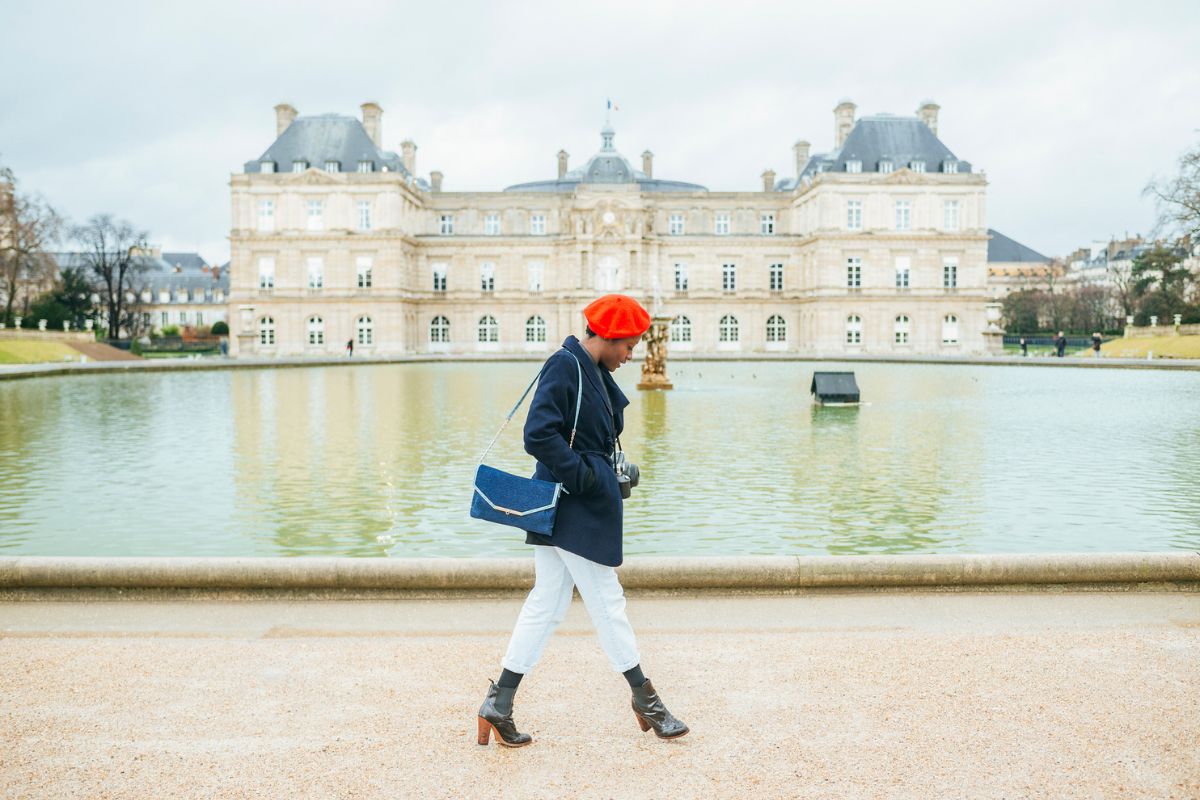 woman walking in Europe in the fall