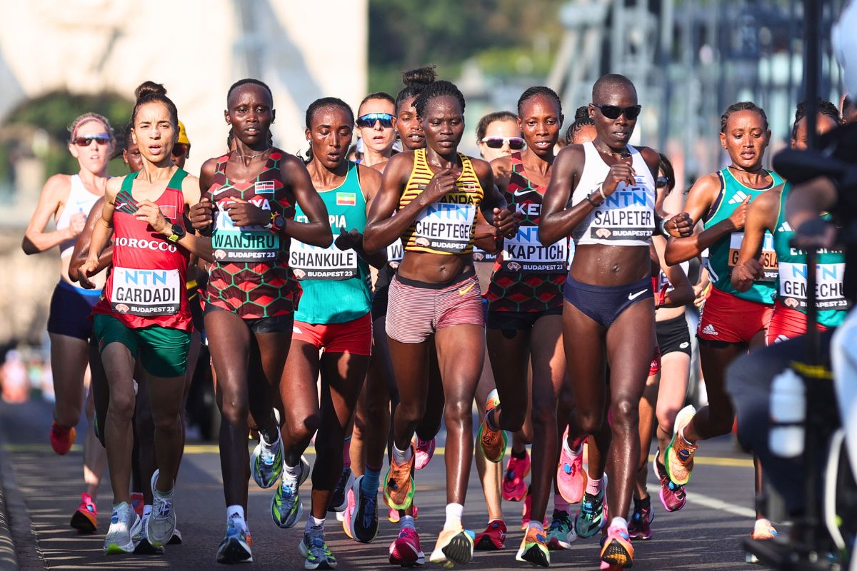 Fatima Ezzahra Gardadi of Team Morocco, Rosemary Wanjiru of Team Kenya, Amane Beriso Shankule of Team Ethiopia, Rebecca Cheptegei of Team Uganda, Selly Chepyego Kaptich of Team Kenya and Lonah Chemtai Salpeter of Team Israel cross the Szechenyi Chain Bridge in the Women's Marathon during day eight of the World Athletics Championships Budapest 2023