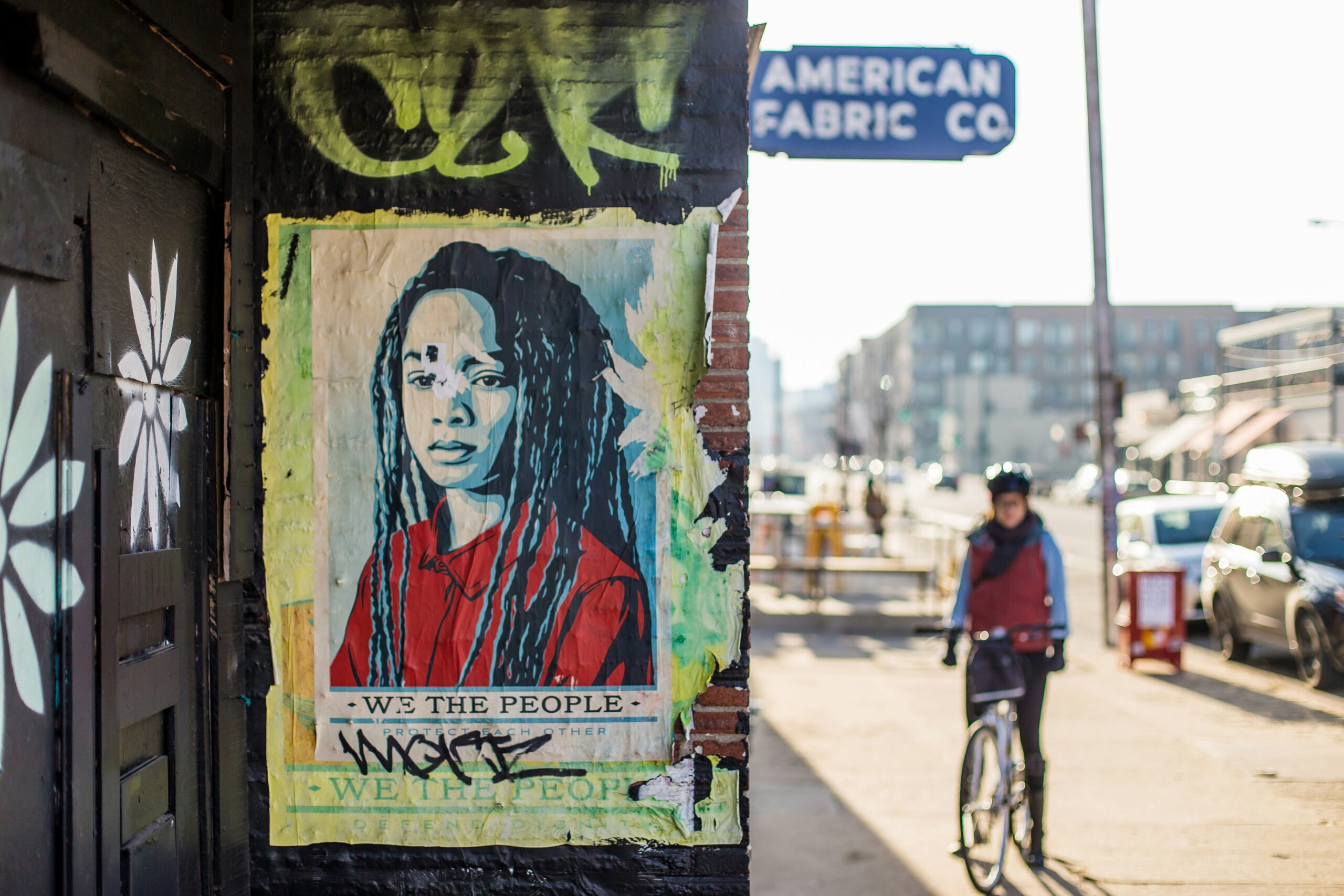 The people of Denver make it a great place to visit. 
Pictured: sign in Denver with local biking 