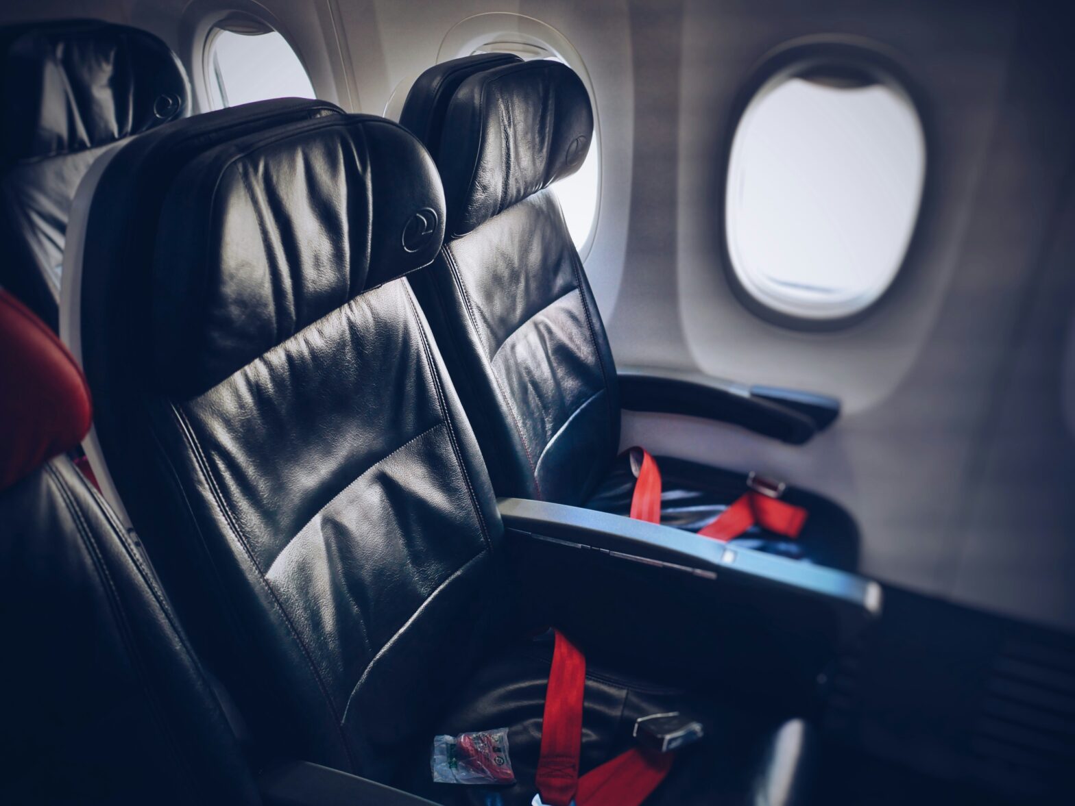 airplane seats red buckle