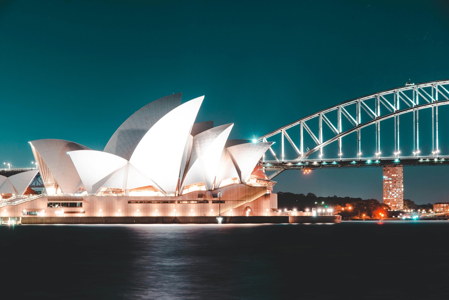 White Sydney Opera House near the water in Sydney, Australia.