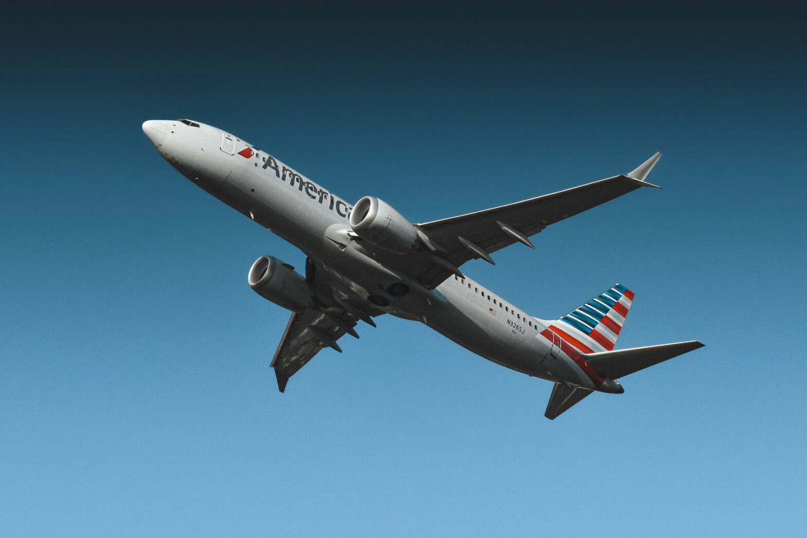 American Airlines aircraft mid-air during takeoff