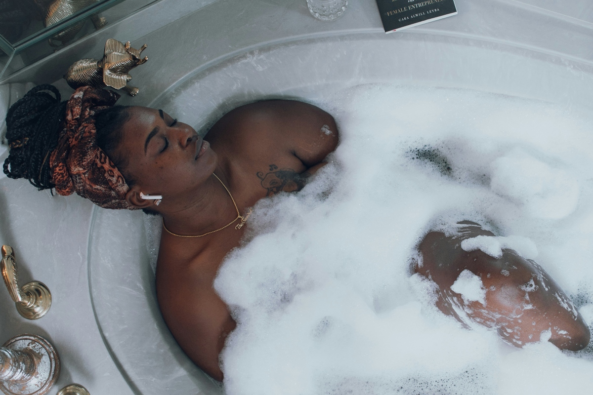 woman in white bathtub