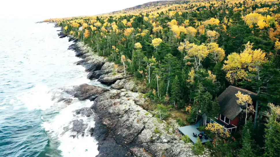 Aerial view of the True North Cabin right on the coast of the lake in Michigan