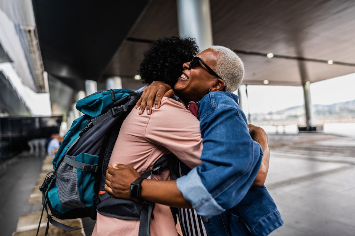 couple hugging outside the airport