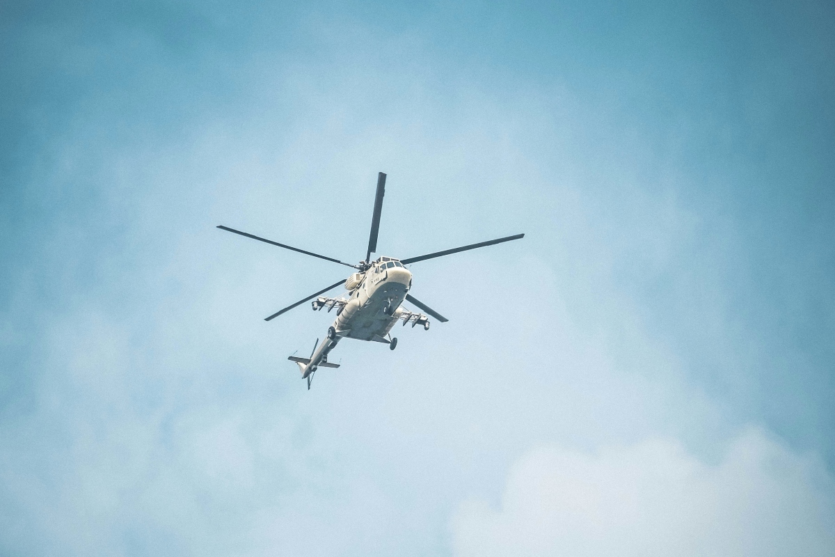 Helicopter in a blue sky