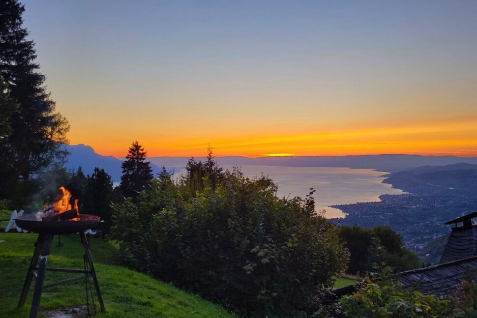 hilltop view of Montreux Switzerland and Lake Geneva at sunset