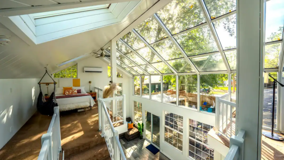 Glass ceiling and view inside of the SoDak Stays Tree House Airbnb in South Dakota