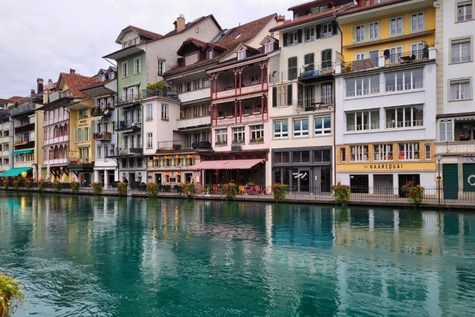 row buildings in Thun Switzerland next to Aare River