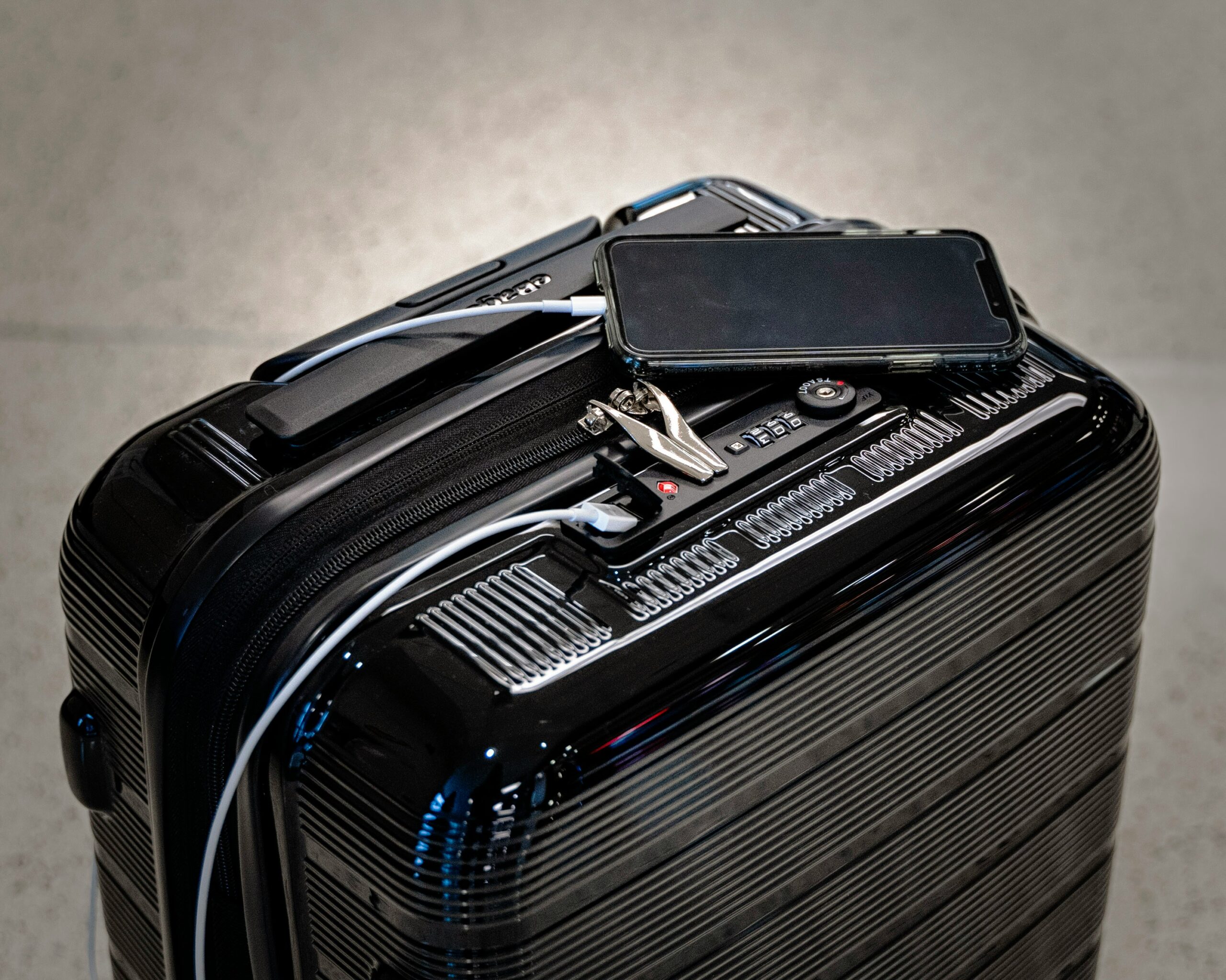 A black suitcase in the airport.