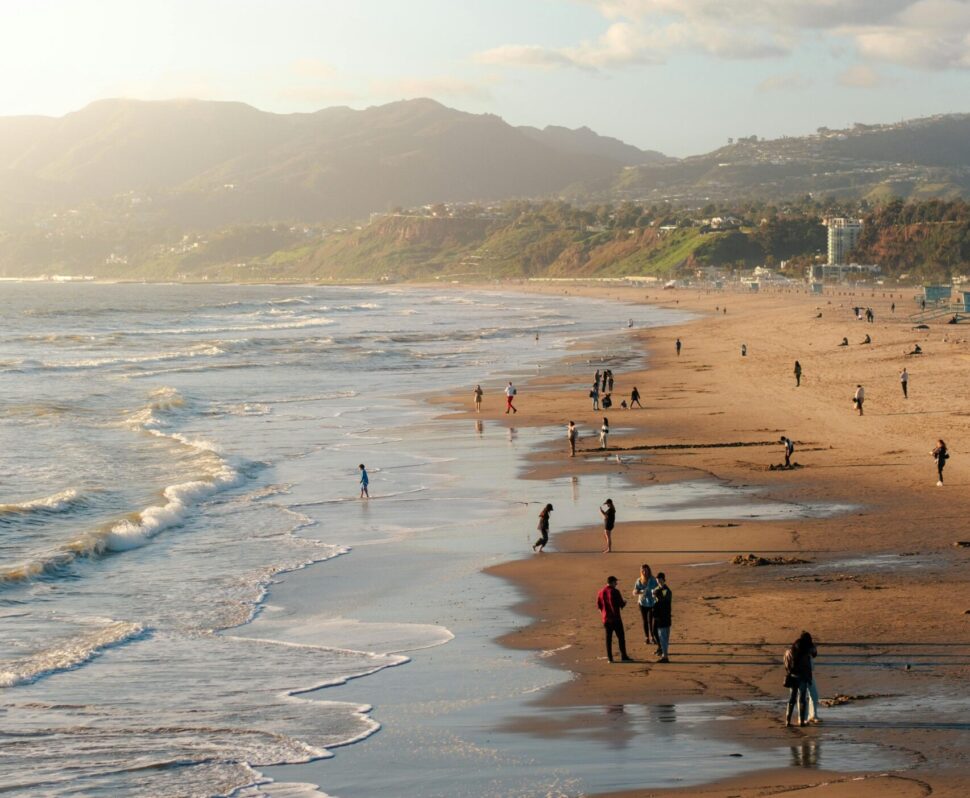 View of the beach, ocean and sand and visitors