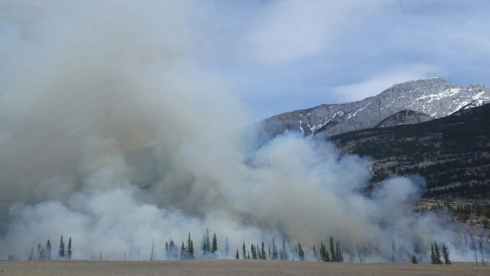 Wildfire in mountainous area.