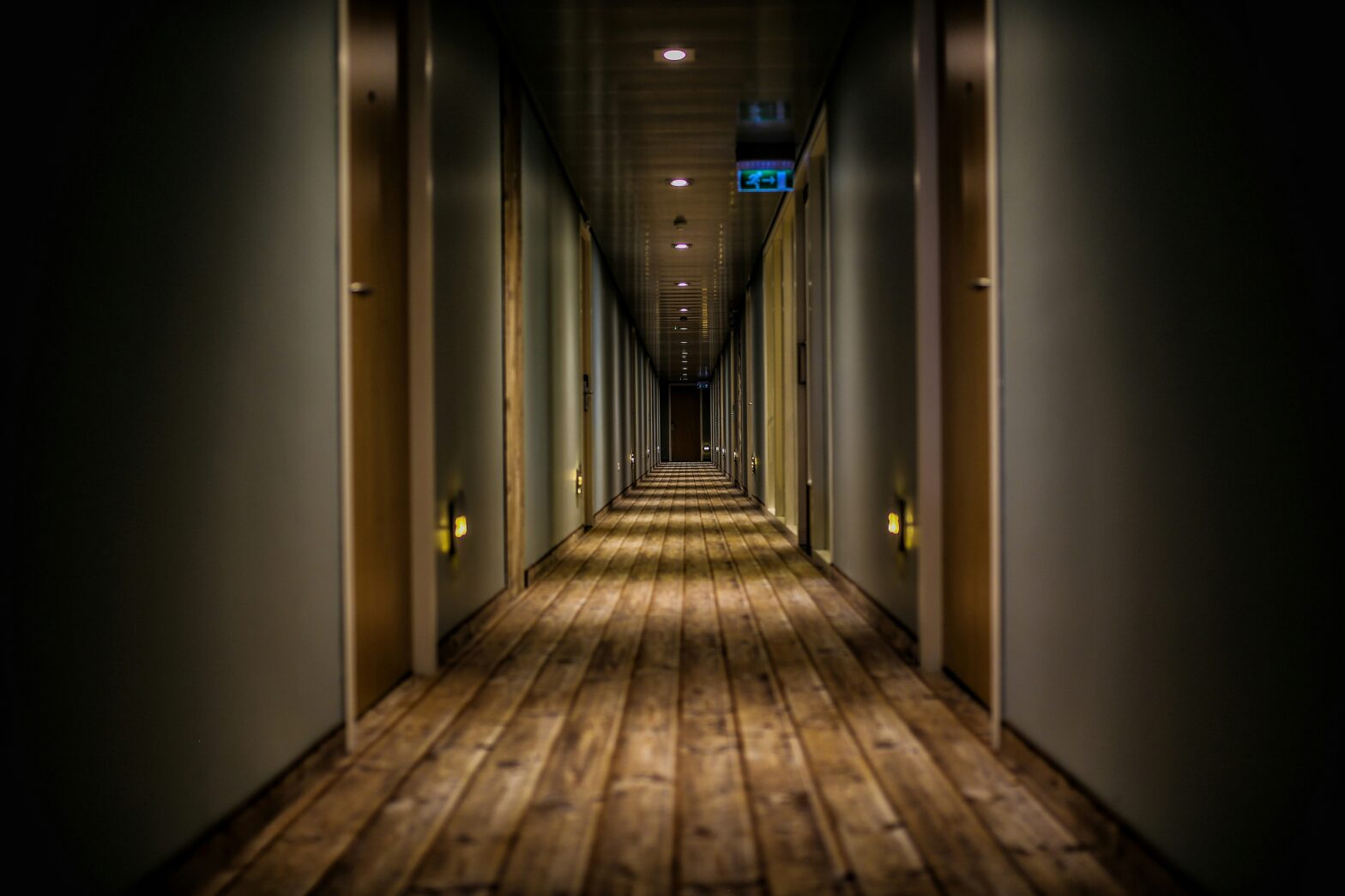 dimly lit hotel corridor