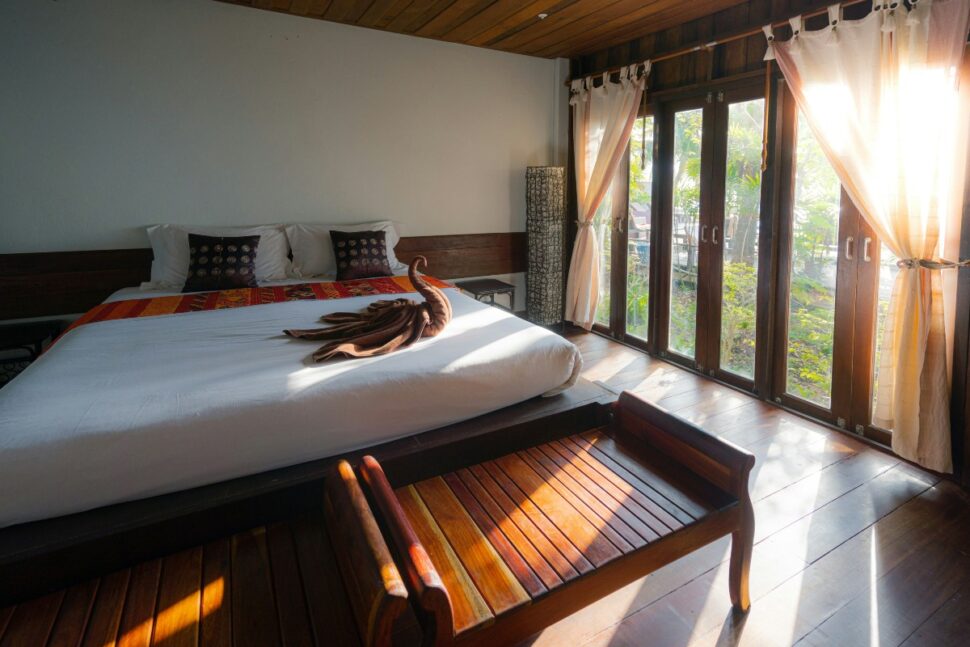 Sunshine in bright bedroom in bungalow