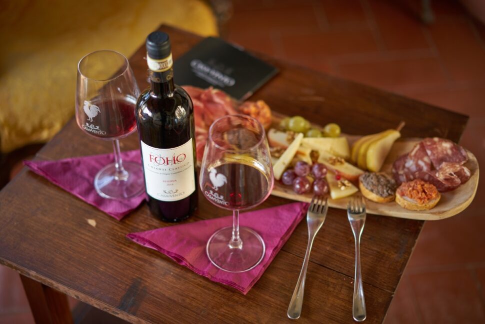 cheese and wine on a table