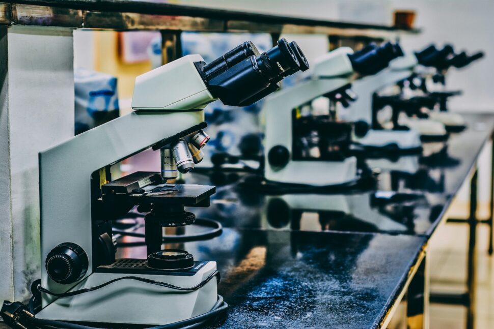 Microscopes on a lab table.