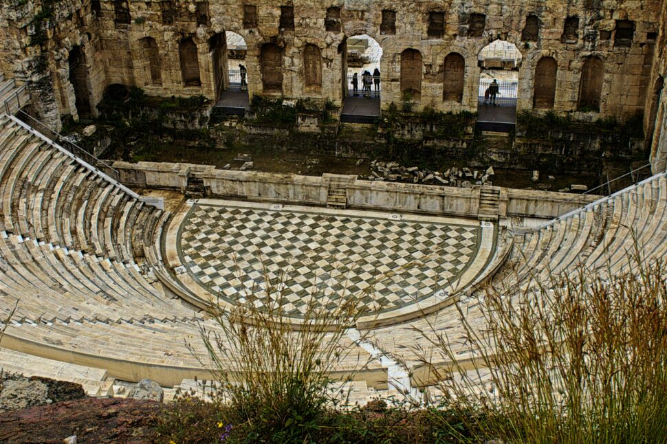 Ancient Rome Amphitheater perched in the Greece Acropolis 