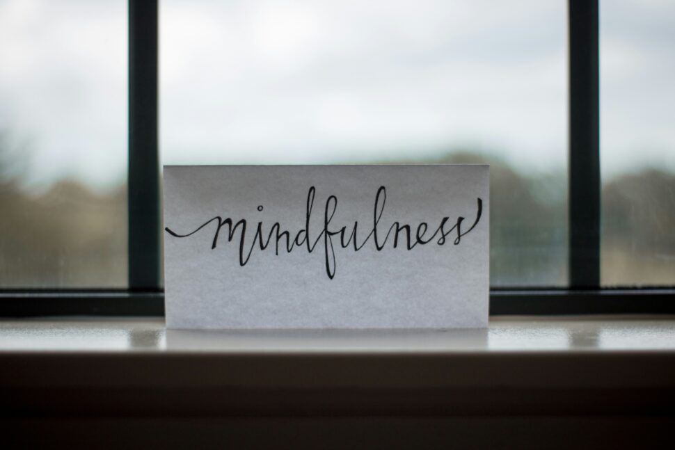 The word 'mindfulness' written in bold black text on a white background, for focus and mental clarity.