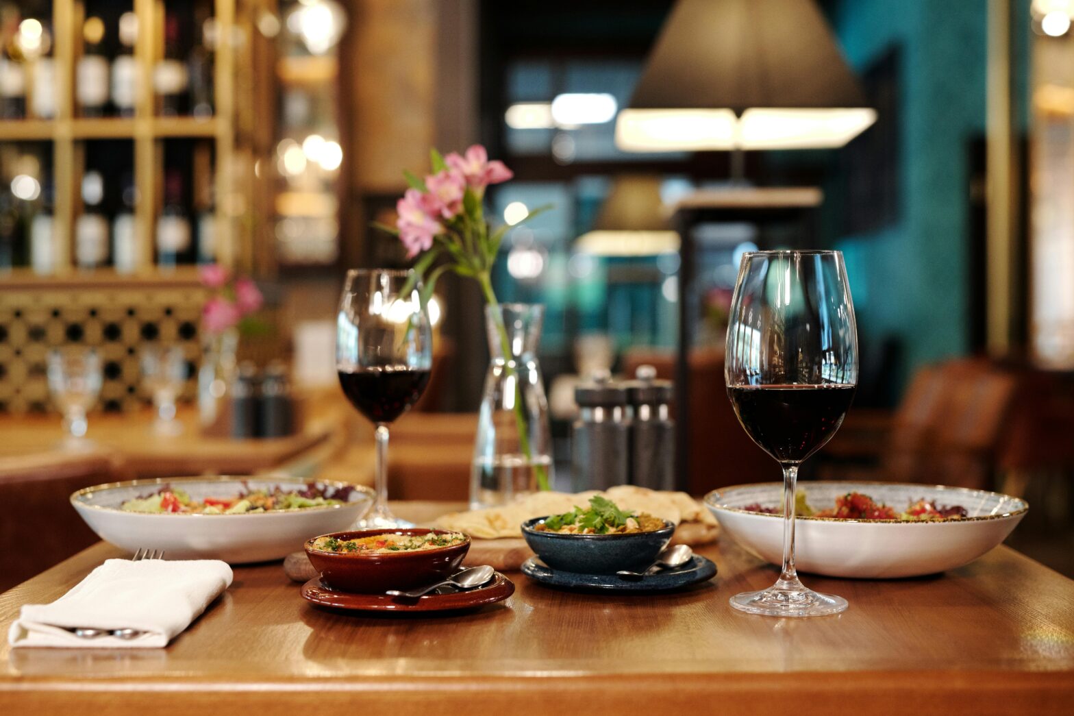 wine with glasses on a restaurant table