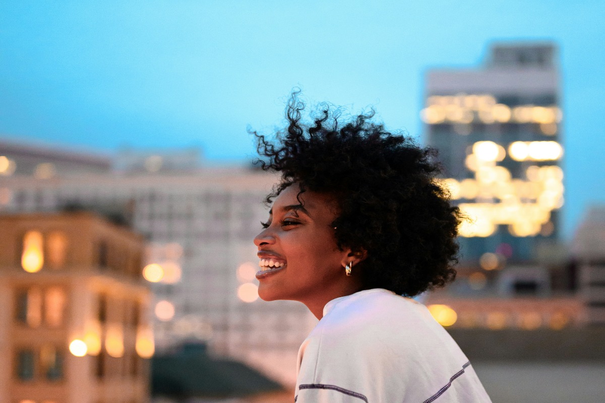 woman standing on roof during sunset in Atlanta, GA, USA