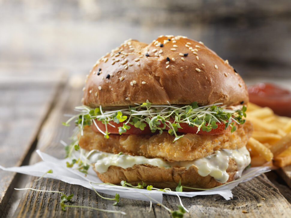 Crispy Fish Sandwich with Tarter Sauce, Lettuce, Tomato on a Brioche Bun