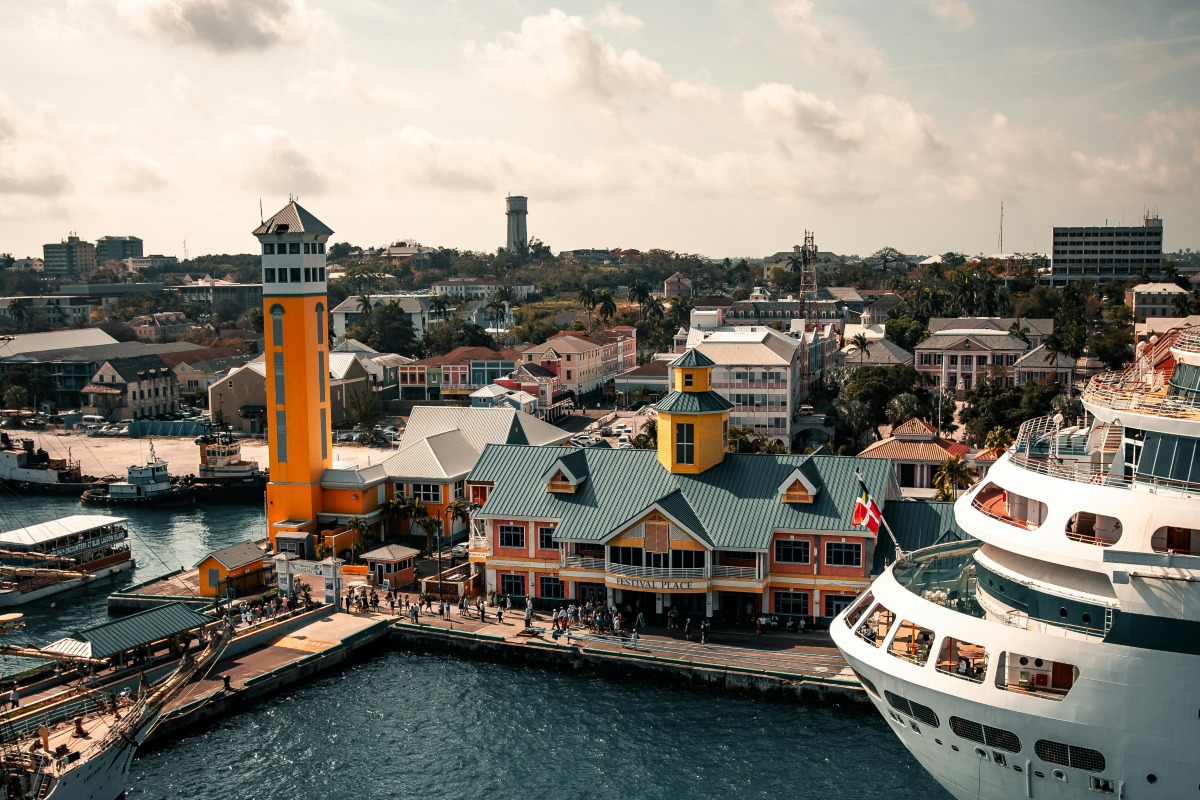 Nassau, the capital of The Bahamas, welcomes a cruise ship to its port.