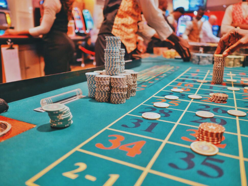 Dealer laying out chips for customers to gamble at a casino in San Diego.