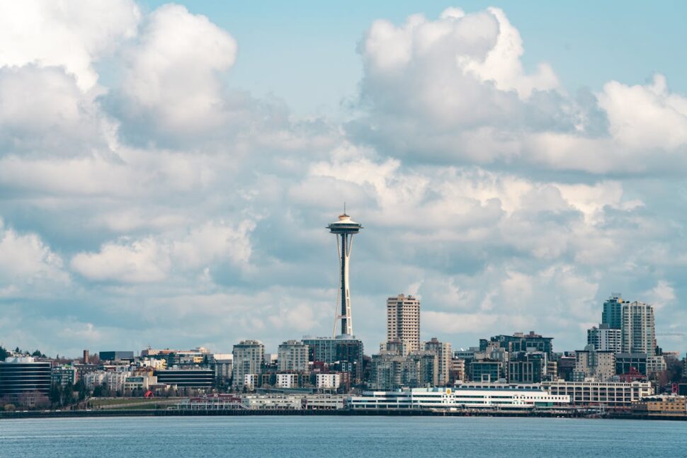 Space needle against a blurred sky over Seattle