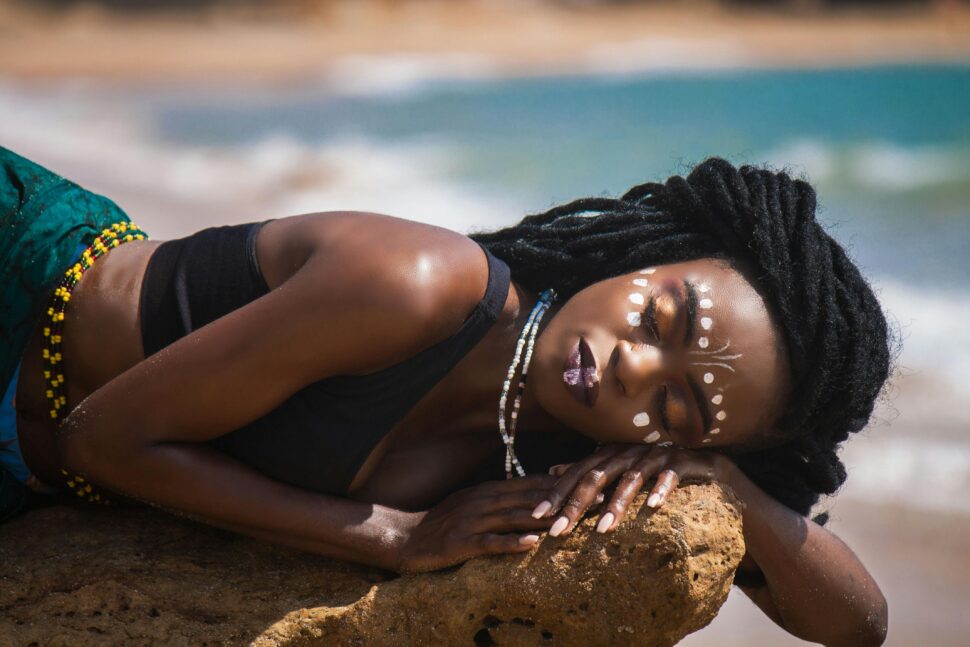 A woman resting at a wellness retreat.