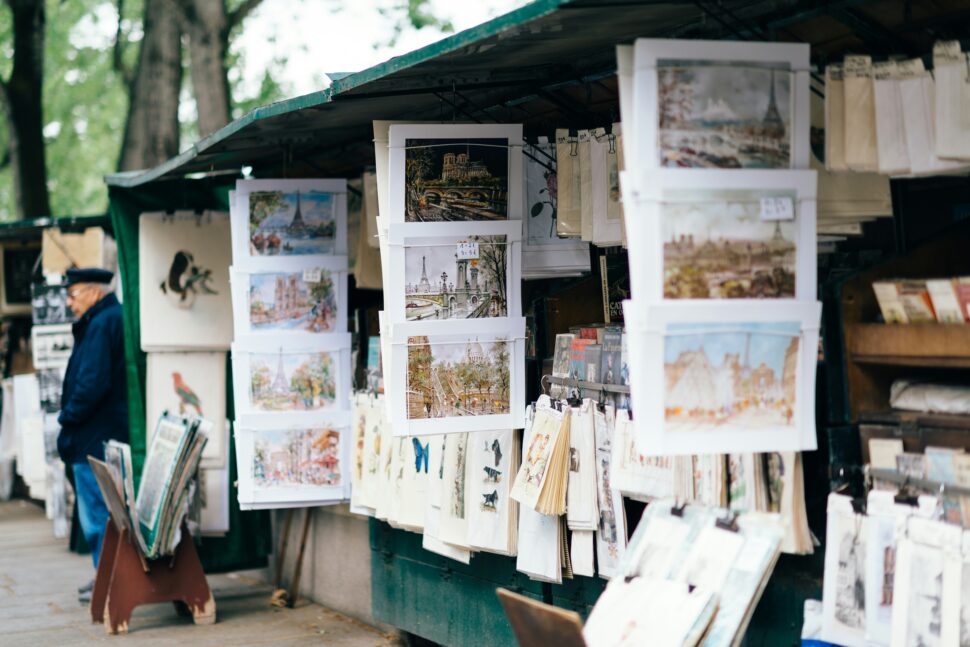 Markets in Paris advertising photos of the city.