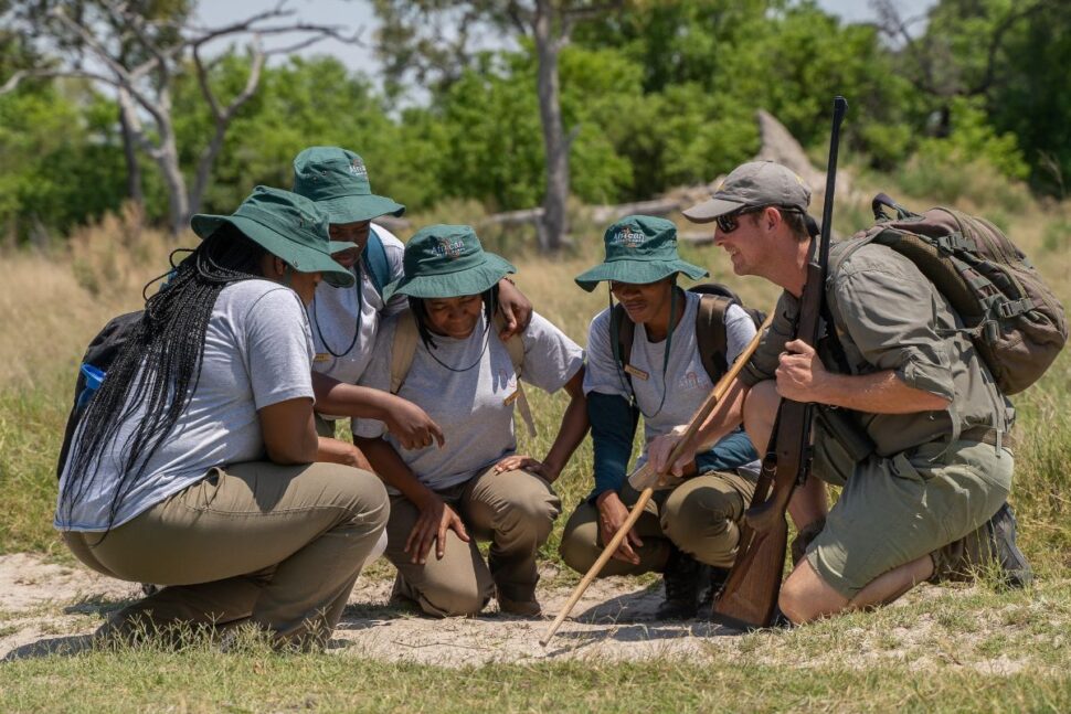 female guides during safari training with instructor