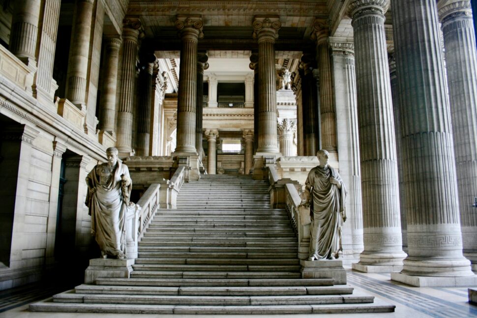 Greek steps framed by greek statues in Belgium