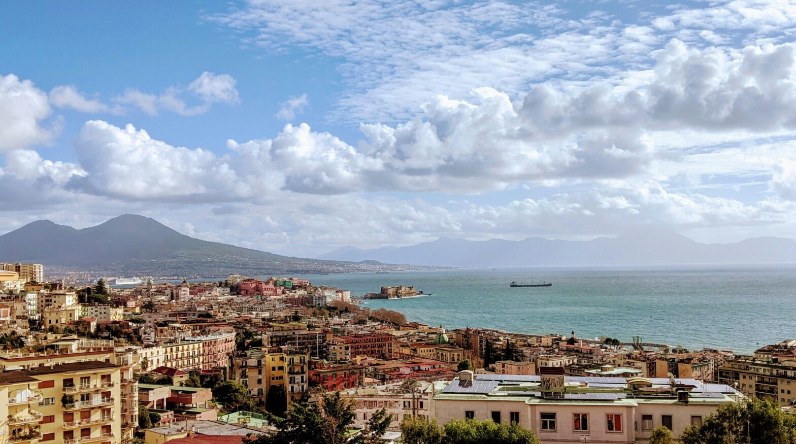 Naples, Italy from a distance with the coast in view