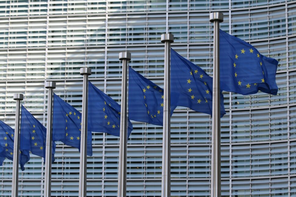 Belgium flags waving in the wind in their business district