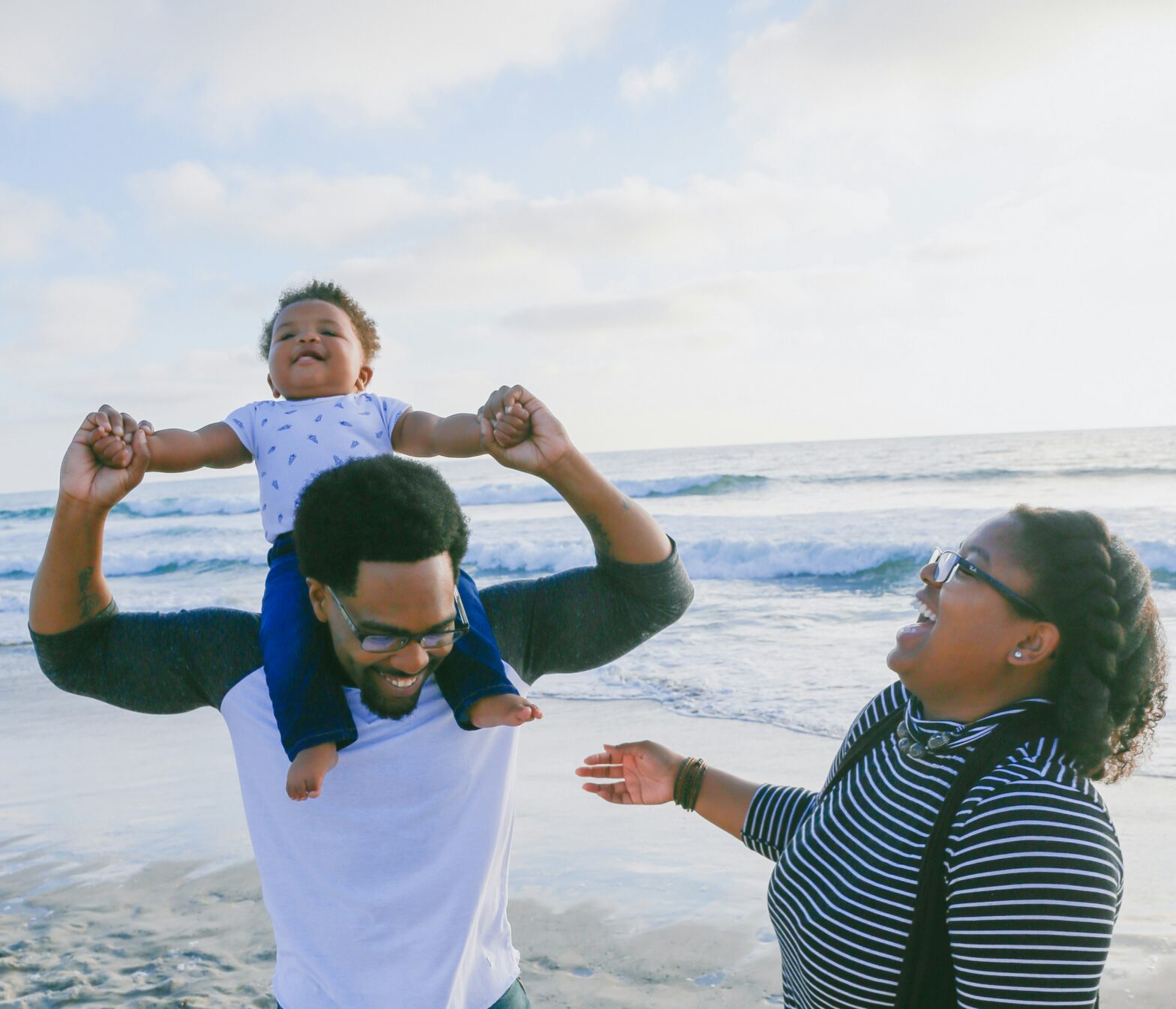 Black family spends time on the beach during vacation