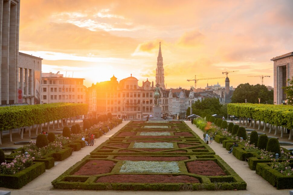 Distant buildings following a manicured garden