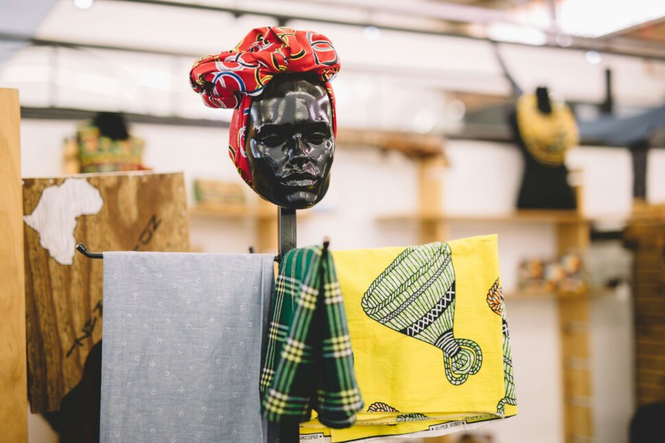 African accessories on a mannequin head.