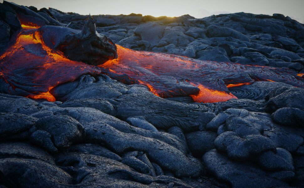 Glow of lava as it cascades down the mountain.