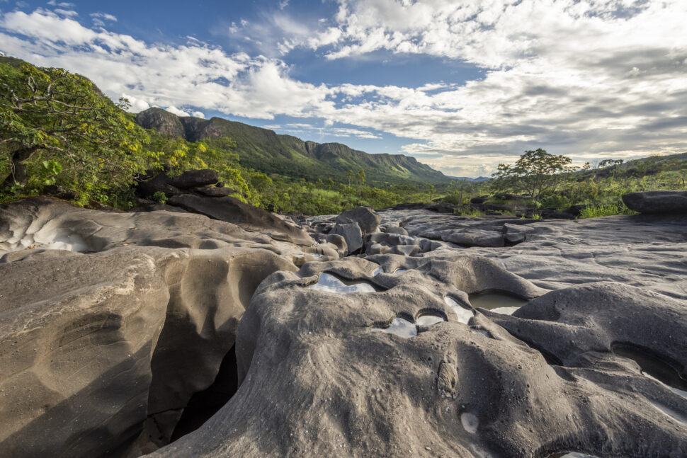 River running among rocks in Vale da Lua Moon Valley, Chapada dos Veadeiros, Goias, Brazil