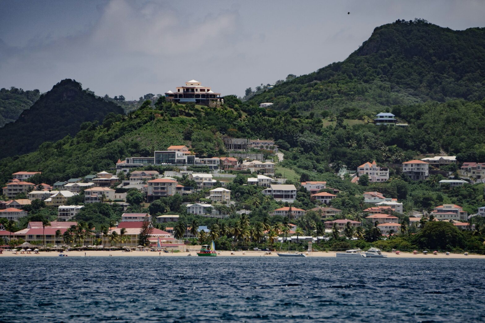 sea view of the peak Piston hills and coastal city of Castries, St. Lucia