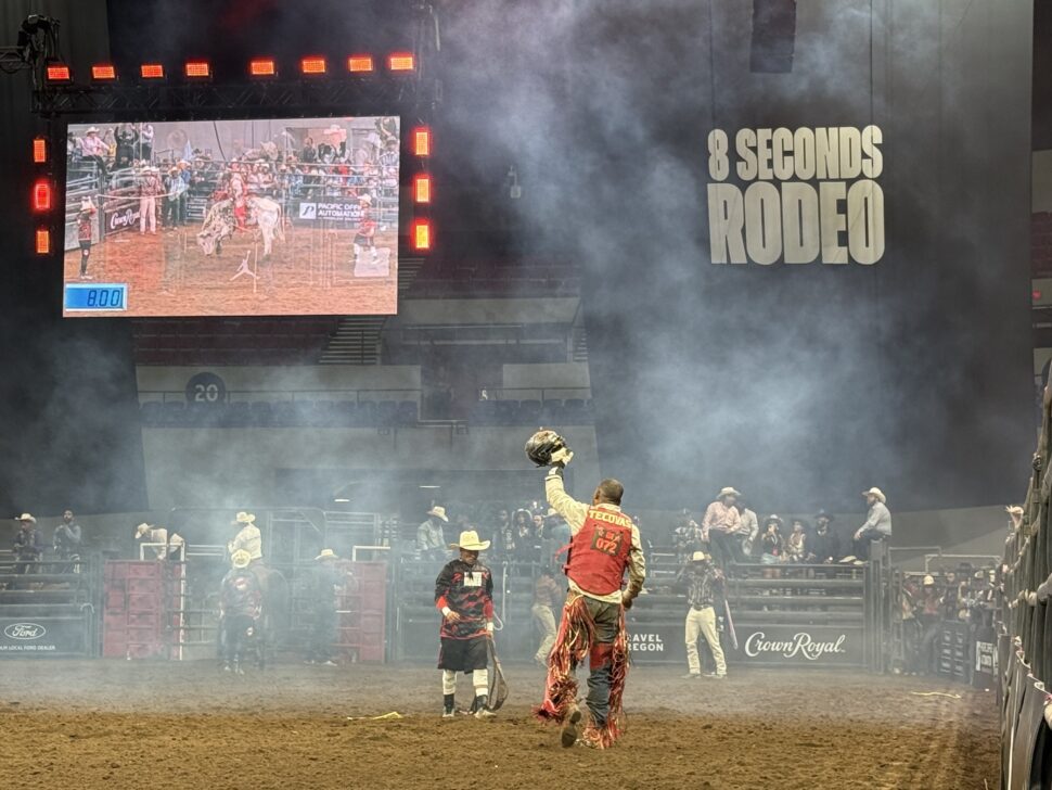 Tank Adams Waves to the crowd at the Black Rodeo, 8 Seconds Rodeo in Portland, Oregon.