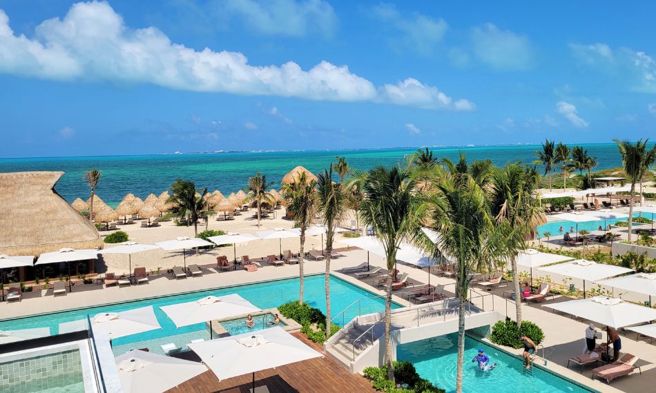 aerial view of Excellence Playa Mujeres resort on a sunny day