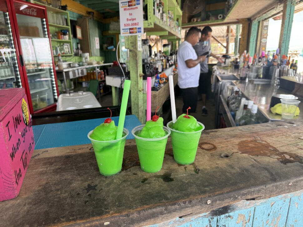 The Bright Green "Lazy Lizard" Cocktail in Caye Caulker, Belize at The Split